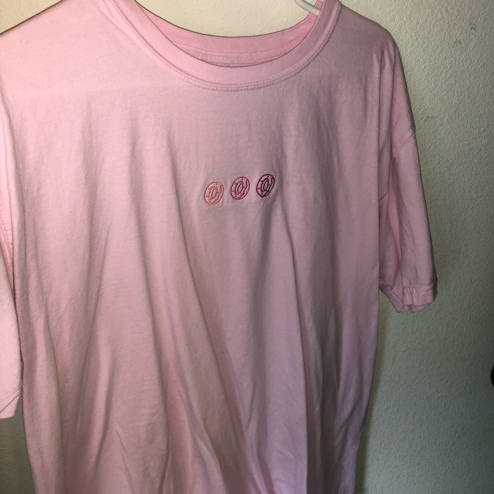 pink odd future shirt.